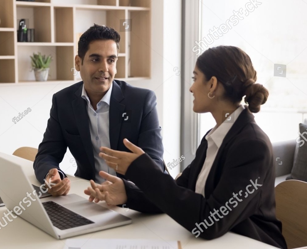 stock-photo-confident-positive-indian-client-and-developer-discussing-online-project-software-project-at-2382358667 (1)